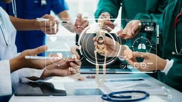 Medical technology network team meeting concept. Doctor hand working with smart phone modern digital tablet and laptop computer with graphics chart interface, with virtual icon photo