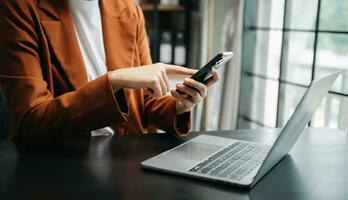 businesswoman hand working with new modern computer using on smartphone and tablet as concept photo