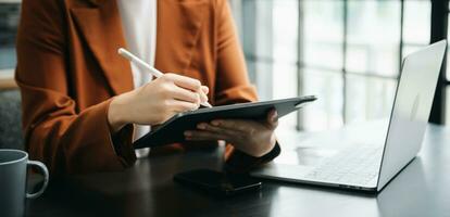 businesswoman hand working with new modern computer using on smartphone and tablet as concept photo