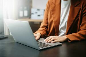 businesswoman hand working with new modern computer using on smartphone and tablet as concept photo