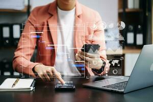 Businessman hand Project manager working and update tasks and Gantt chart scheduling virtual diagram.with smart phone, tablet and laptop photo