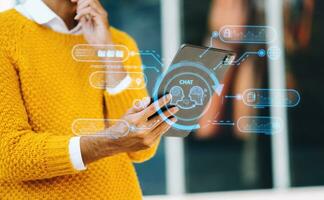 Man using chatbot in computer and tablet  smart intelligence Ai.Chat with AI Artificial Intelligence, developed by OpenAI generate. Futuristic technology, robot photo