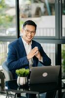 Modern business Asian man in the office with copy space at office photo