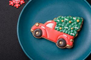 Ceramic round plate decorated with festive elements on the Christmas table photo