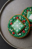 Beautiful festive Christmas gingerbread made by hand with decoration elements photo