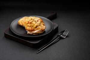 Delicious meat fried with Dijon mustard with salt, spices and herbs photo