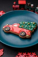 Ceramic round plate decorated with festive elements on the Christmas table photo