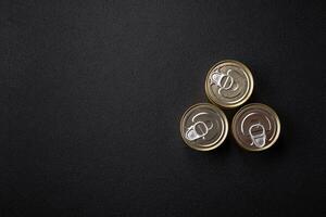 Round metal can with canned fish or meat with a key photo