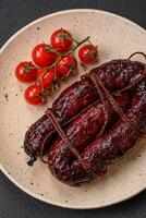 Delicious black blood sausage or black pudding with spices and herbs photo