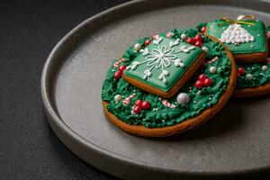 Beautiful festive Christmas gingerbread made by hand with decoration elements photo