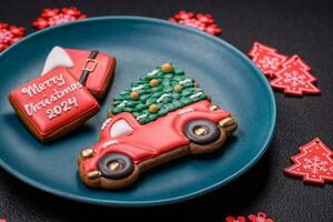 Ceramic round plate decorated with festive elements on the Christmas table photo