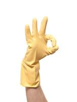 manos en amarillo guantes aislado en blanco foto