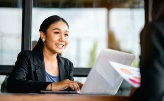 young business woman working intently and have a bright smile Meeting of the work plan financial planner finance staff happy work Financial and investment planner photo