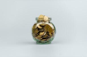 Saving money, coin in glass jar, investment, income, salary, cash flow, currency. Financial savings set. Financial Assets Inheritance Financial Growth and Investment photo