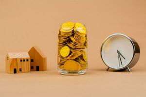 house gold and time real estate Financial loans, wealth, wealth, saving gold, investing in gold, gold market, gold stocks, finance and investment. photo