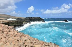 Waves Crashing on to the Bluffs By Andicuri Beach photo