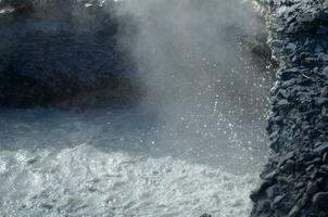 Boiling Mud and Water in Geothermal Fumarole photo