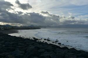 Lots of Dark Clouds at Dusk at Ribeira Grande on Sao Miguel photo