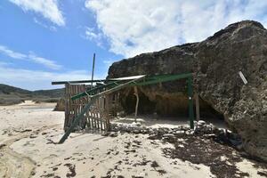 Structure on a White Sand Beach in Aruba photo