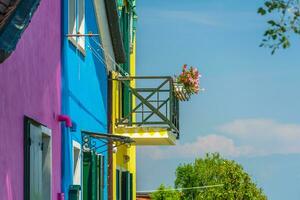 View of the colorful Venetian houses at the Islands of Burano in Venice photo