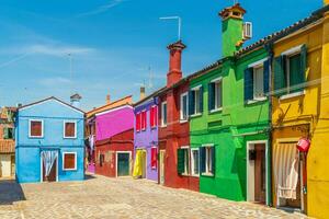 View of the colorful Venetian houses at the Islands of Burano in Venice photo