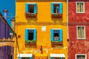View of the colorful Venetian houses at the Islands of Burano in Venice photo