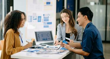 UX developer and ui designer brainstorming about mobile app interface wireframe design with customer breif and color code photo