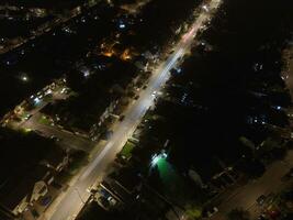 High Angle View of Luton City of England During Night. Drone's Camera footage Was Captured on Early Night on October 12th, 2023 photo