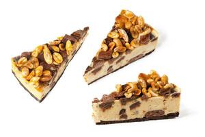 set pack of different angles slices of cheesecake caramel with peanuts and cookies on white background isolated photo