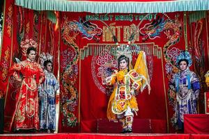 Ho Chi Minh City, Vietnam - August 19, 2023 Artists performing Vietnamese classical opera as know as Hat Boi in Binh Thanh District photo