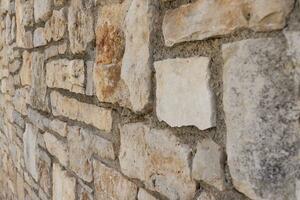 Close-up of a natural stone wall photo