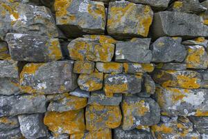 Close-up of a natural stone wall photo