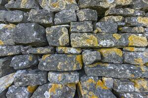 Close-up of a natural stone wall photo