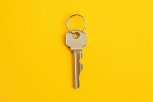 a key, isolated on yellow background. AI Generated photo