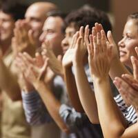 People listening and clapping at conference and presentation. AI Generated photo