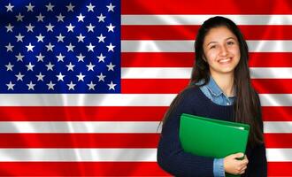 Teen student smiling over United States flag photo