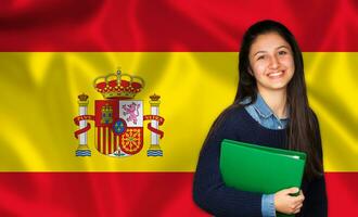 adolescente estudiante sonriente terminado Español bandera foto