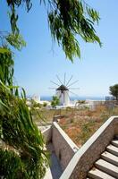 Windmill in Santorini Island photo