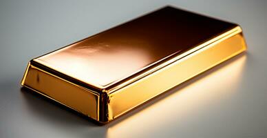 Shiny gold bar from above isolated on white background - AI generated image photo