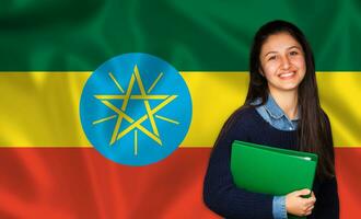 Teen student smiling over Ethiopia flag photo