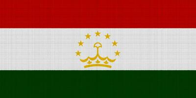 Flag of Republic of Tajikistan on a textured background. Concept collage. photo