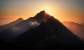 sunrise over clouds of high mountains in a mountain landscape photo