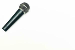Vocal microphone for singing karaoke isolated on white photo