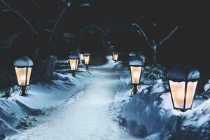 Magic path with lanterns in the winter fairy kingdom. photo