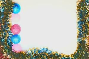 New Year's Christmas background with toys, balls, garlands, tree snowy rain photo