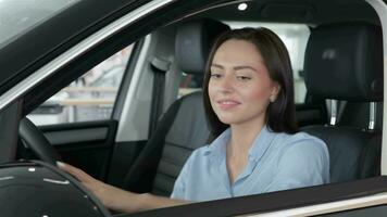 Woman look out the window of car video