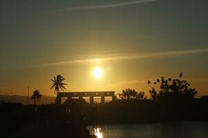 Golden clouds in the evening day with sunsets photo