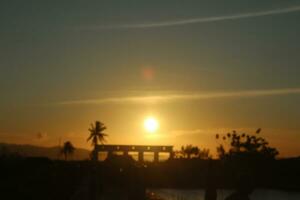 Golden clouds in the evening day with sunsets photo