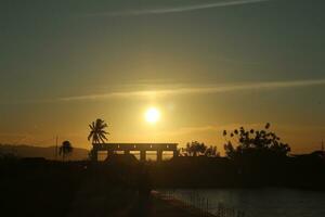 Golden clouds in the evening day with sunsets photo