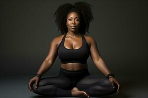 Black woman practicing yoga in lotus position Generative AI photo